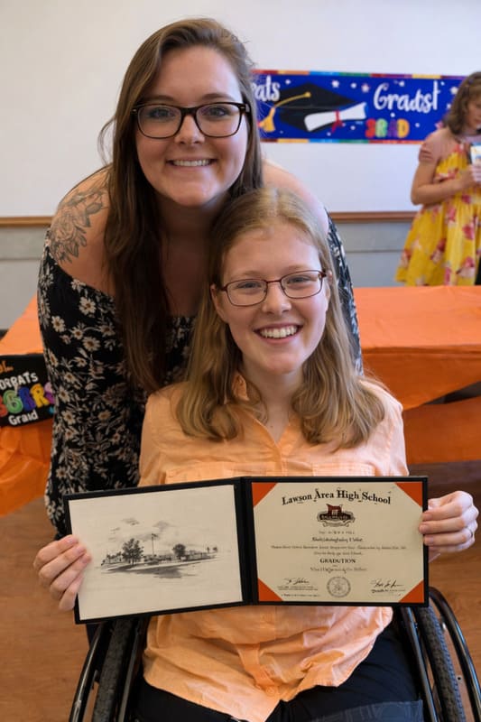 MCC family celebrating a high school graduation milestone
