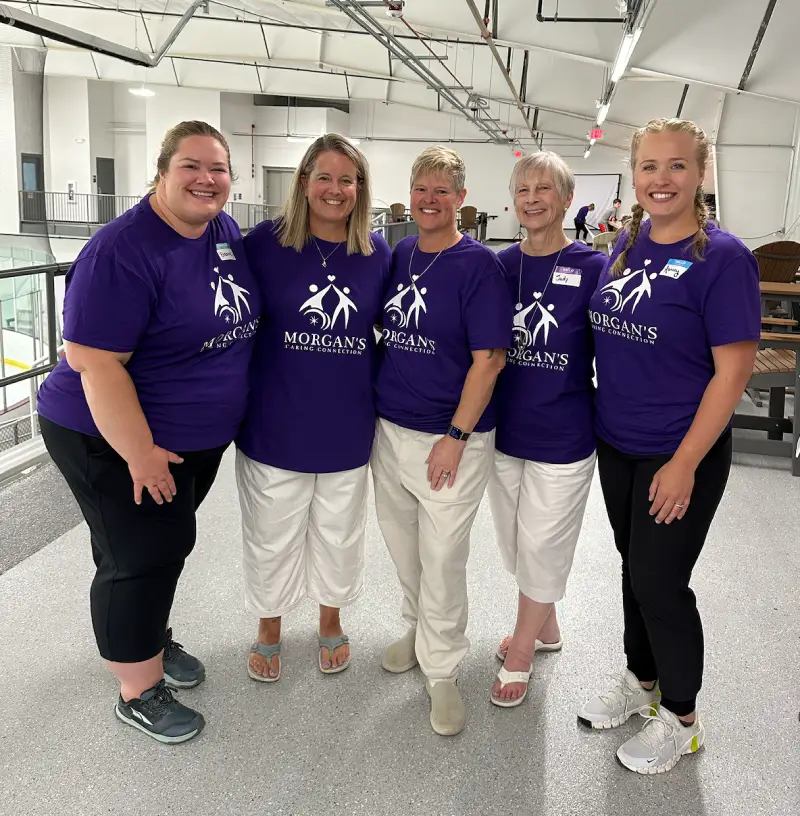 MCC volunteers supporting special needs families at the 2024 Kickoff Celebration