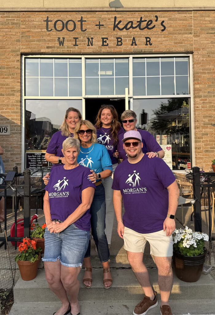 MCC Sip and Support fundraiser volunteers helping special needs families