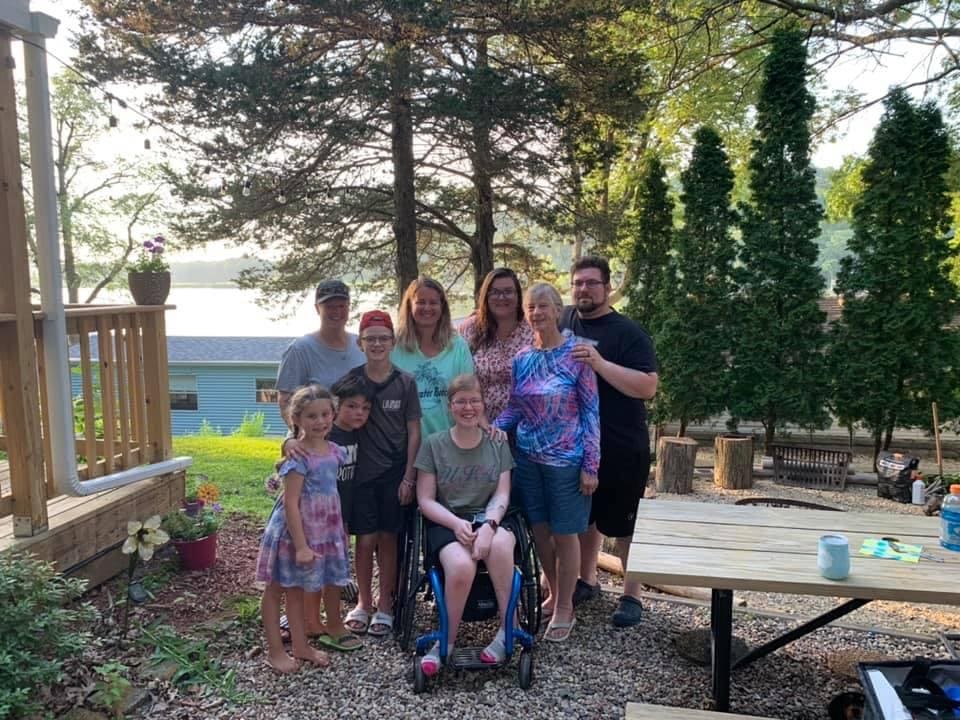 Family spending time together near a lake